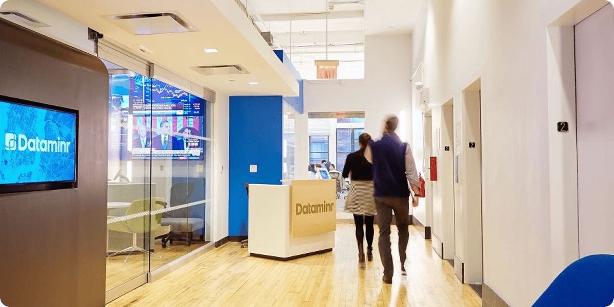 Dataminr's New York office – reception area with company branding and team members.