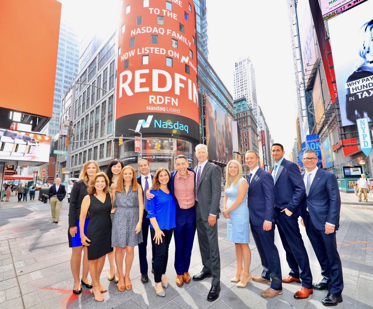 The Redfin team in Times Square beside the Nasdaq display on the company's IPO day.